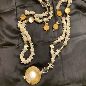 Cream stone body necklace with earrings.